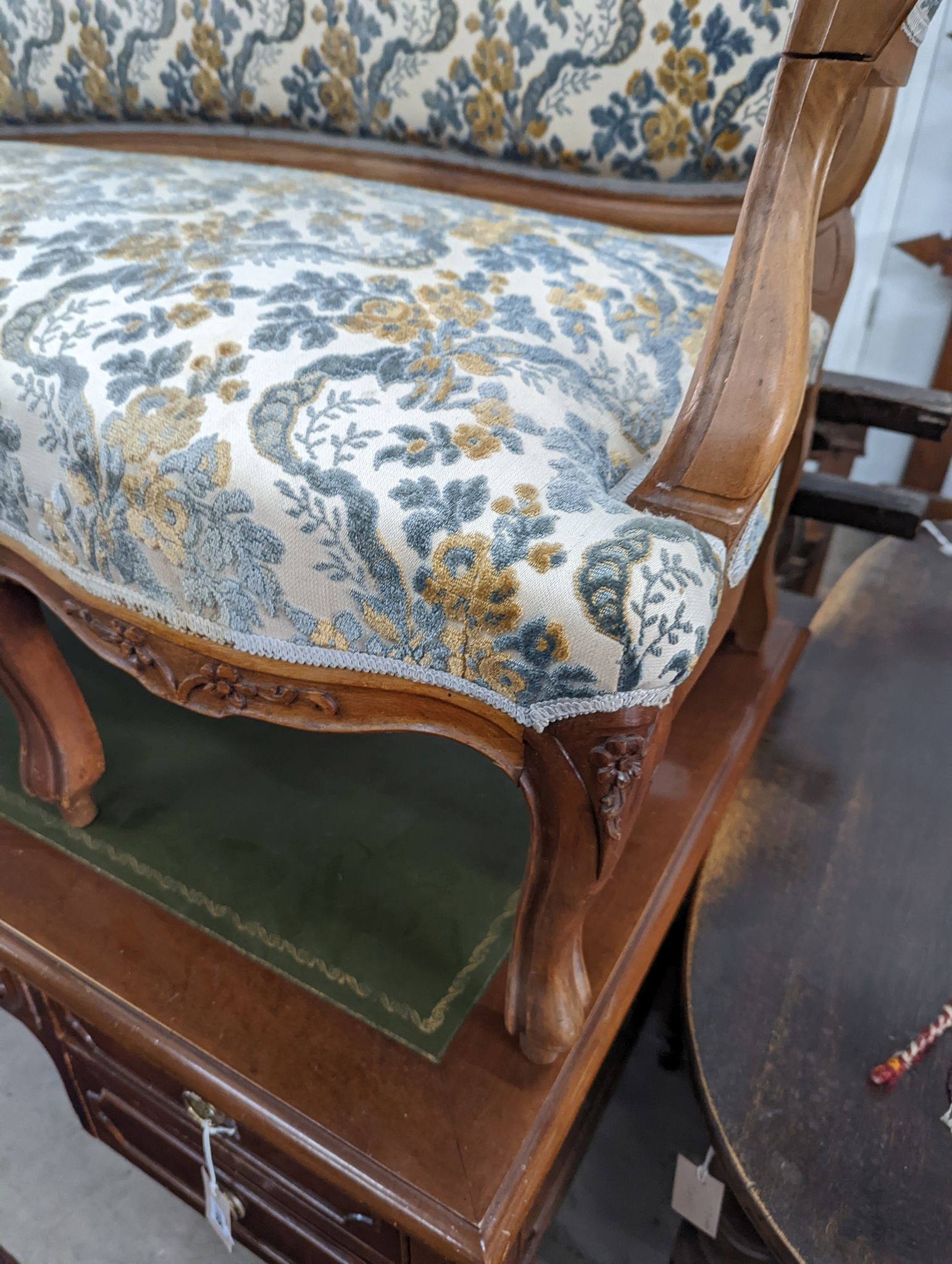 A Louis XVI style carved walnut settee (wormed), length 140cm, depth 58cm, height 104cm
